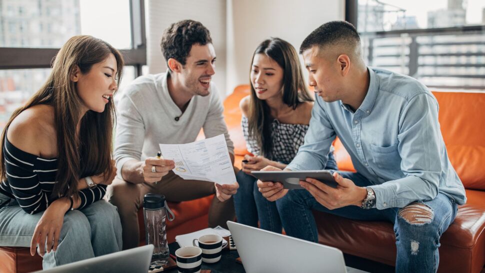 millenials-sitting-on-couch-at-work millenials-sitting-on-couch-at-work