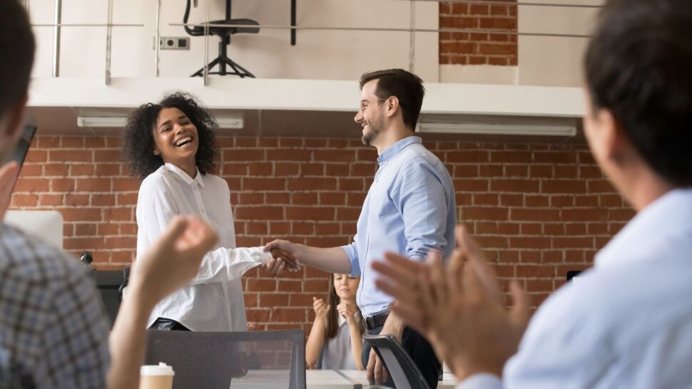 woman-getting-congratulated-for-promotion
