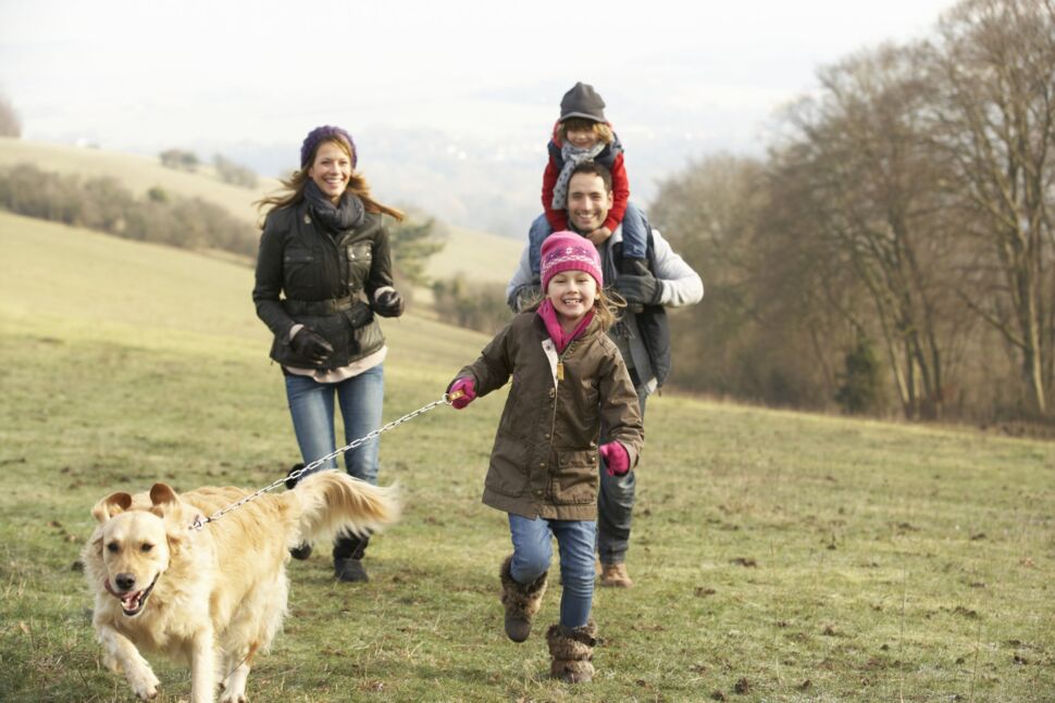 happy-family-walking-outside