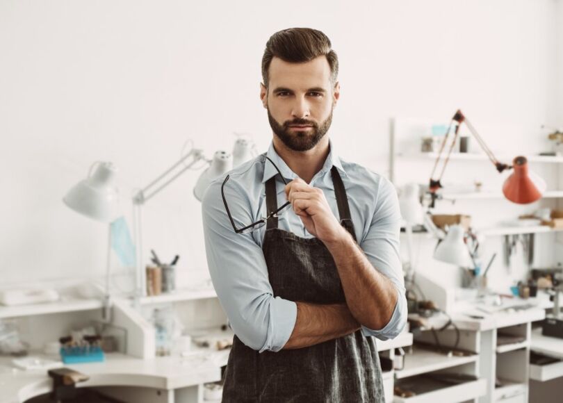 craftsman-standing-in-his-workspace