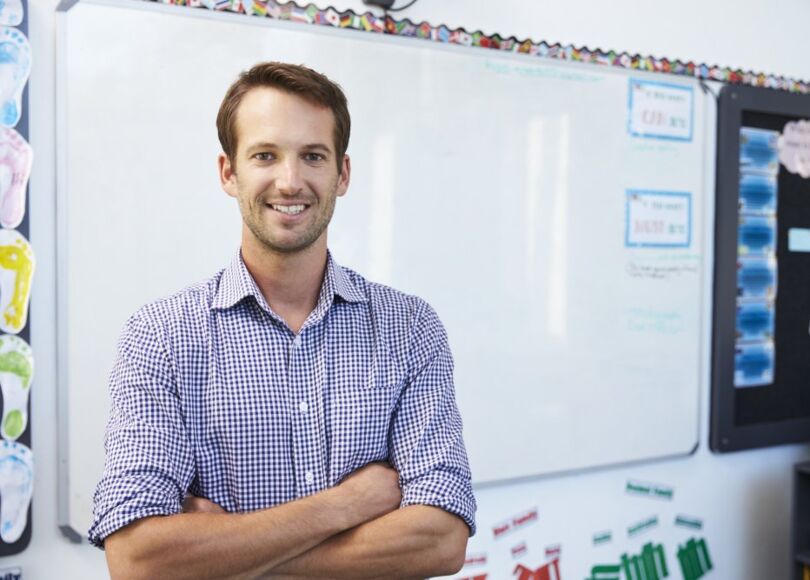 teacher-standing-in-front-of-class teacher-standing-in-front-of-class