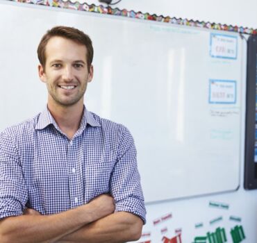 teacher-standing-in-front-of-class