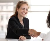 woman-shaking-customers-hand woman-shaking-customers-hand